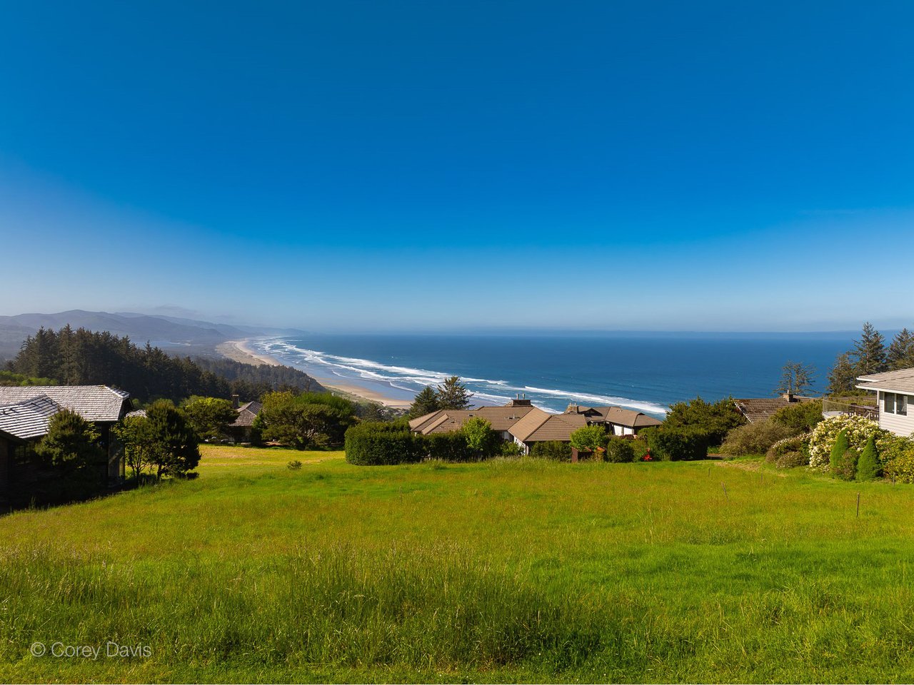 Sold homesite at Meadow Loop 14 in Neahkahnie Meadow with ocean, bay, dune, coastline, and mountain views
