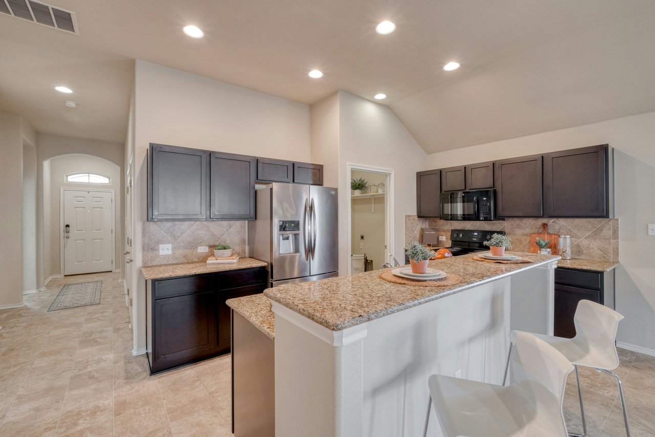 Rare Cul-de-Sac Gem in Manor – With No Neighbor on One Side and Access to HOA-owned Greenspace Right Outside Your Doorstep!