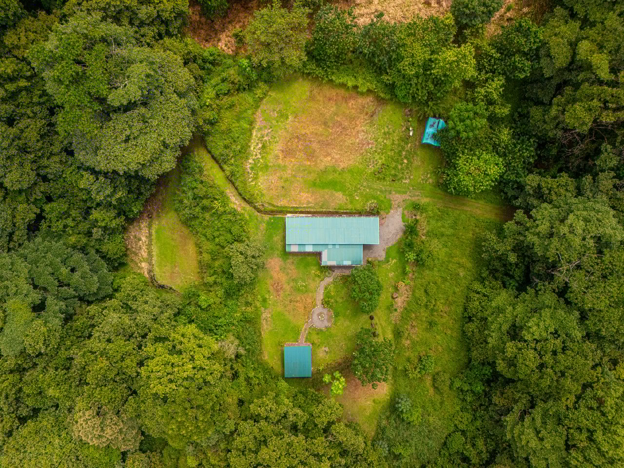 Plant Your Roots at Tierra Bendita! 2.5 Acres, River Frontage, 2 Bedroom Home, Private, Easy Access!