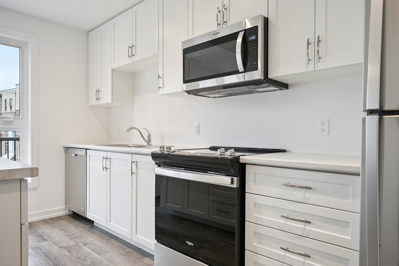 Brand-new, never-lived-in stacked townhome