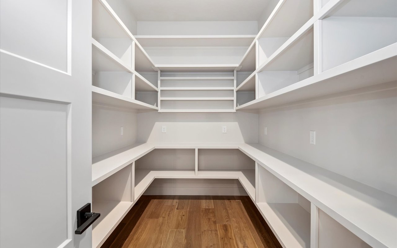 Pantry with shelving and receptacles