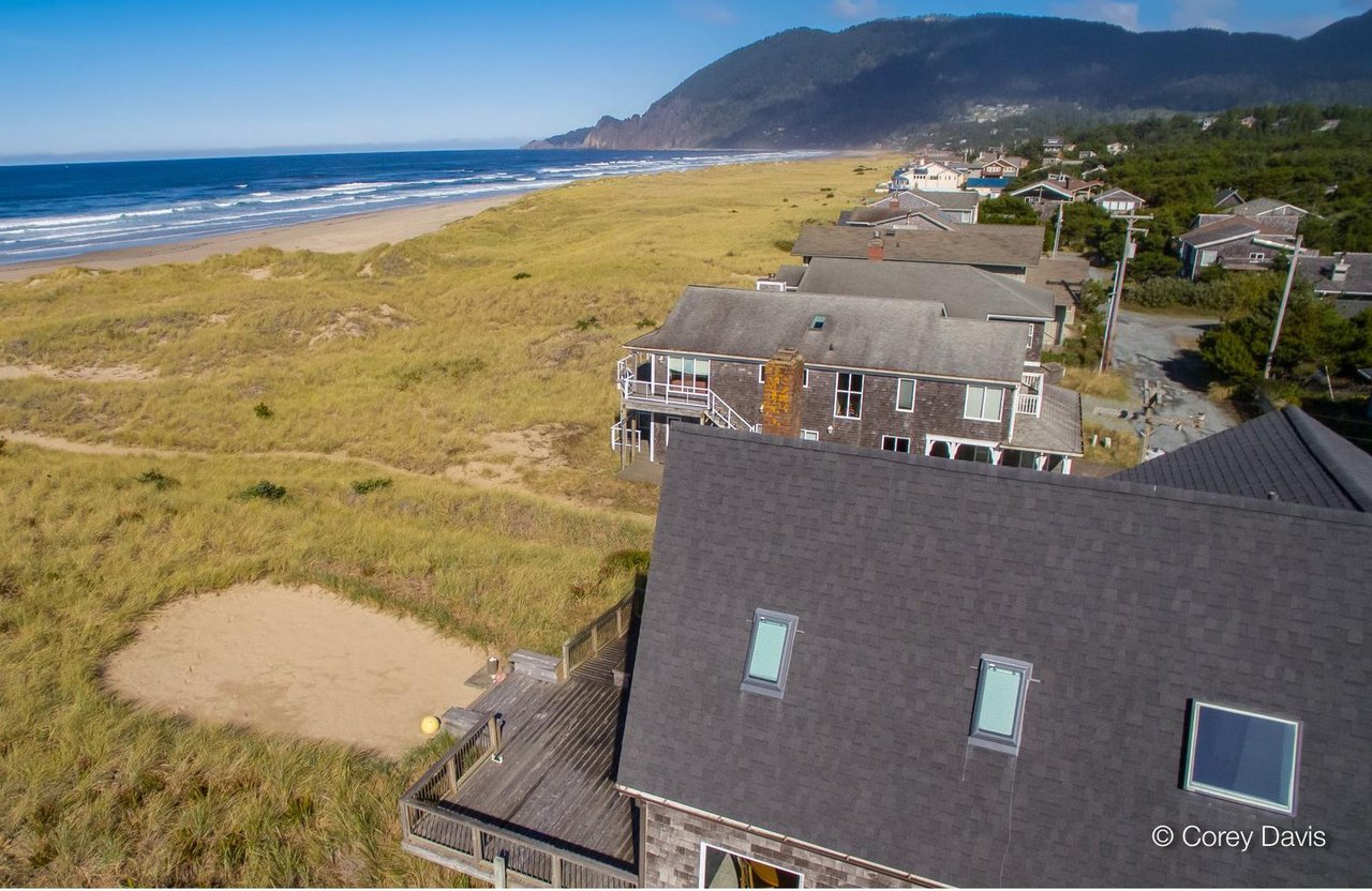 Sold oceanfront home at 8825 Ocean Crest Ln in Manzanita Oregon represented by Meadow Davis of Home + Sea Realty with coastline views and beach access