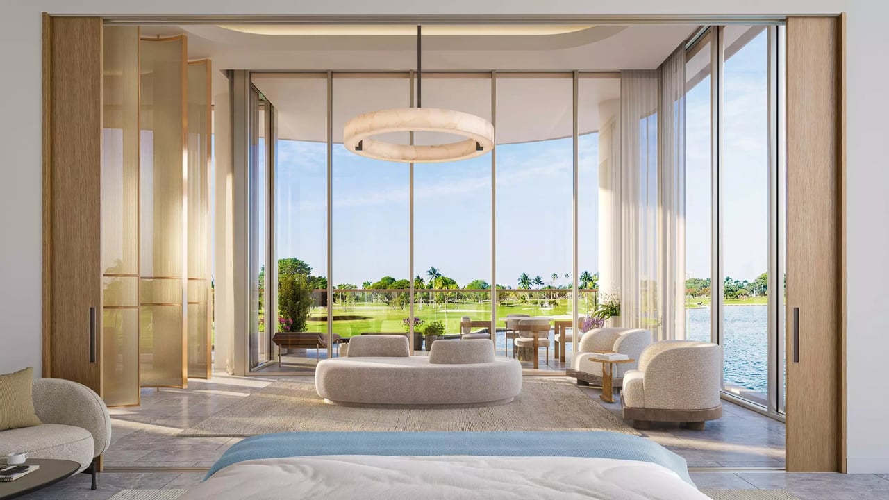 Rendering of an Indian Creek penthouse bedroom opening to a waterfront terrace.