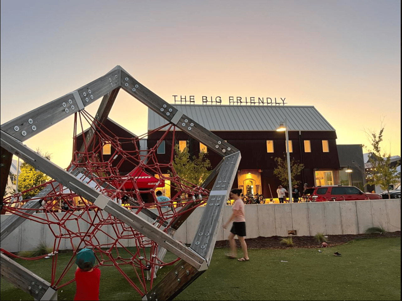 Guests enjoying tacos from Taco Nation and sushi from Akai Sushi next to The Big Friendly patio in Oklahoma City.