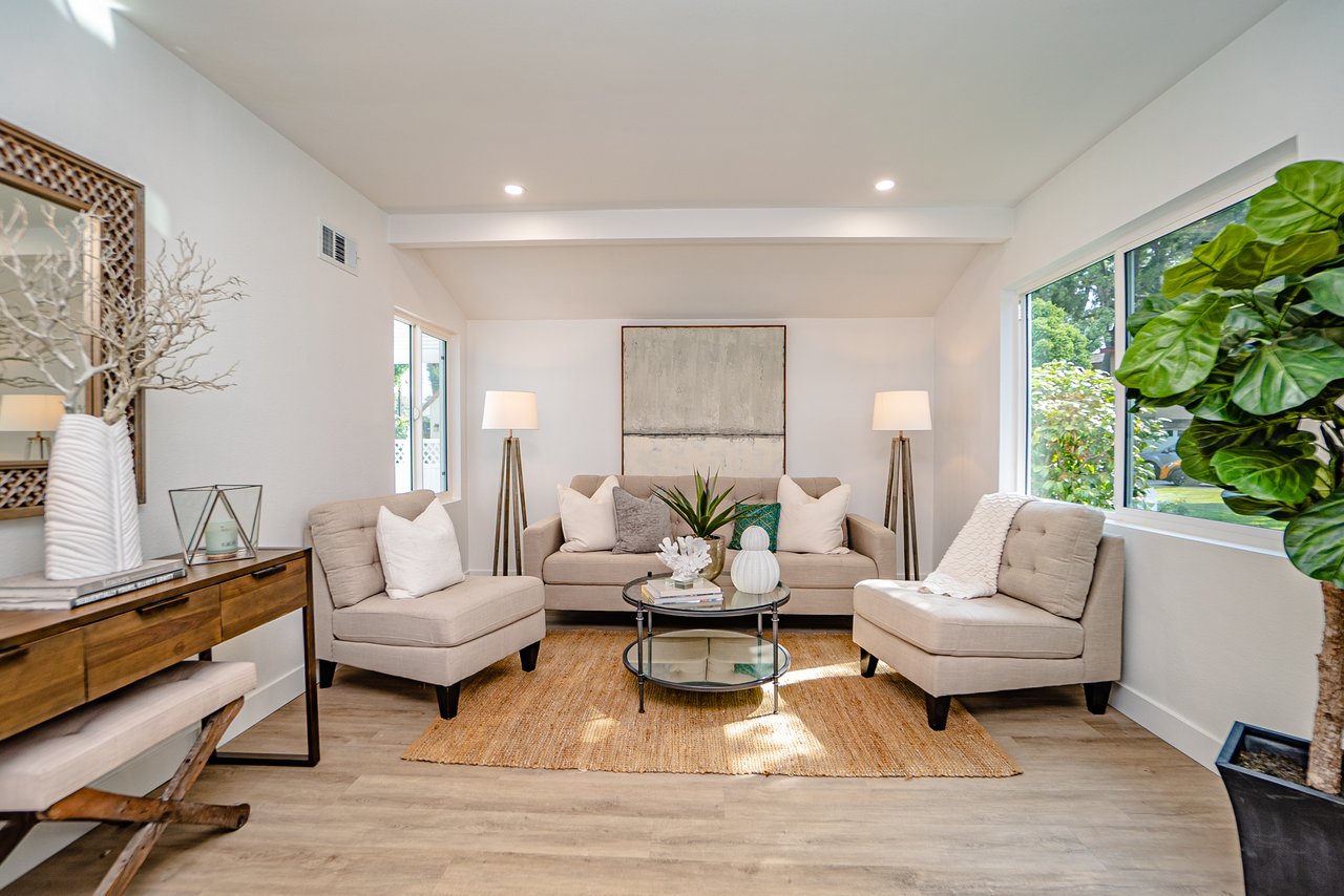 Well-designed living room in a Long Beach home featuring natural light and a comfortable, functional layout
