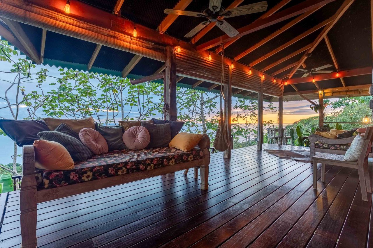 A Handcrafted Residence Immersed in Nature Above the Canopy Ocean View Architectural Home