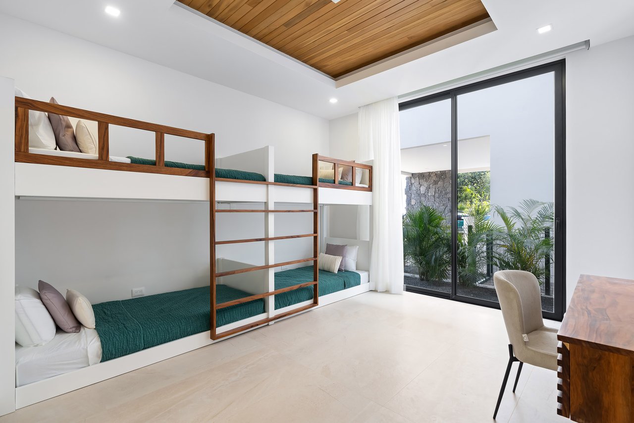 Villa Tropical Dawn | 4-Bedroom Modern Oasis in Bosques de Pinilla with Forest Views & Resort-Style Amenities