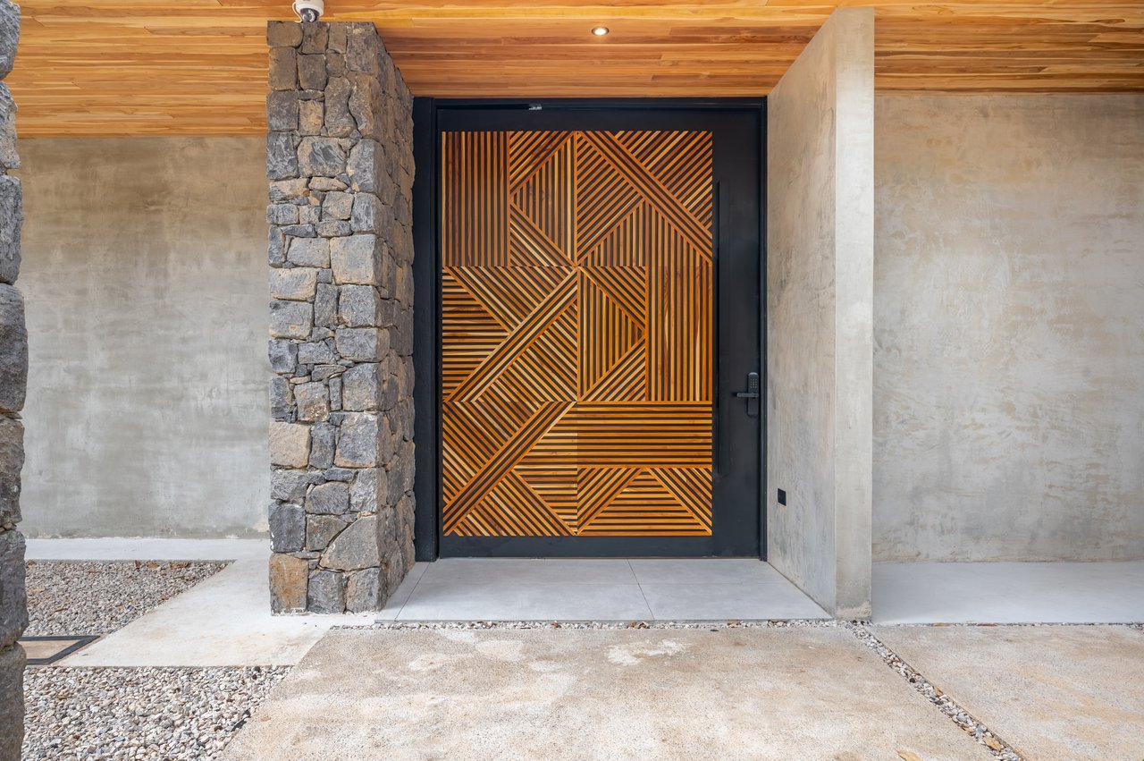 Casa Uchuva | Architectural Harmony of Wood, Stone, and Light