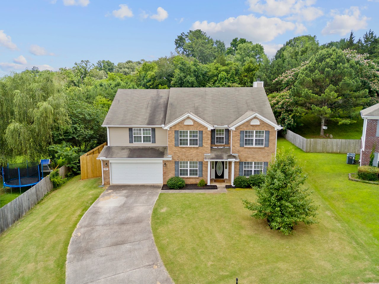 LOTS of Space both Inside and Outside!! Large Fenced in Backyard!