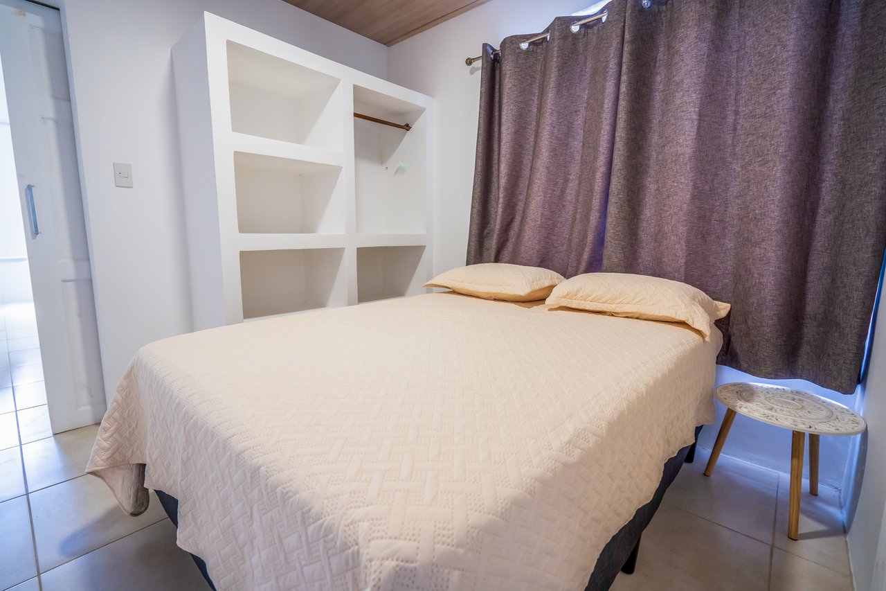 A House With An Upper Live-In Suite & Two Fully Serviced Downstairs Rental Apartments Less Than 1 km From The Entrance to Marino Ballena National Park