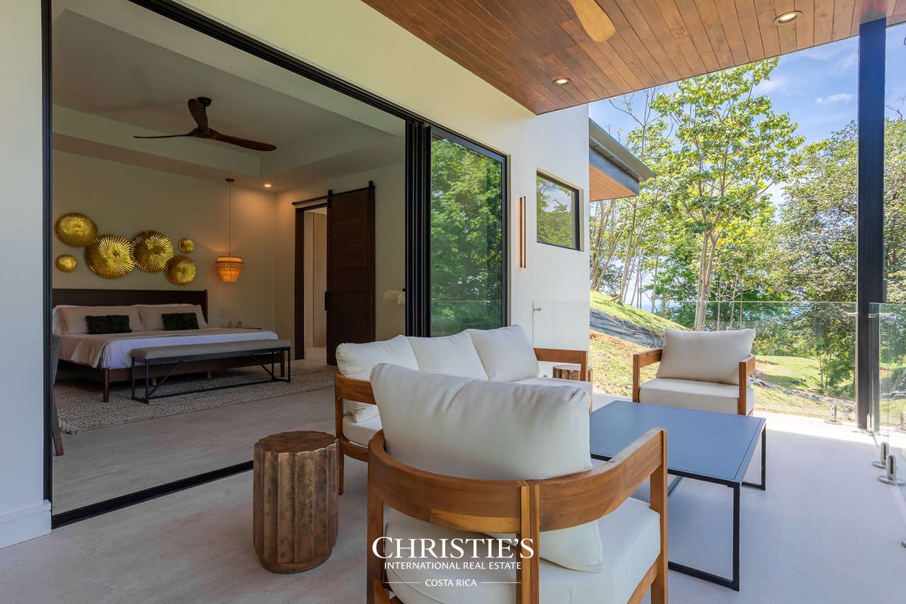 Modern Tropical Ocean & Mountain View Home