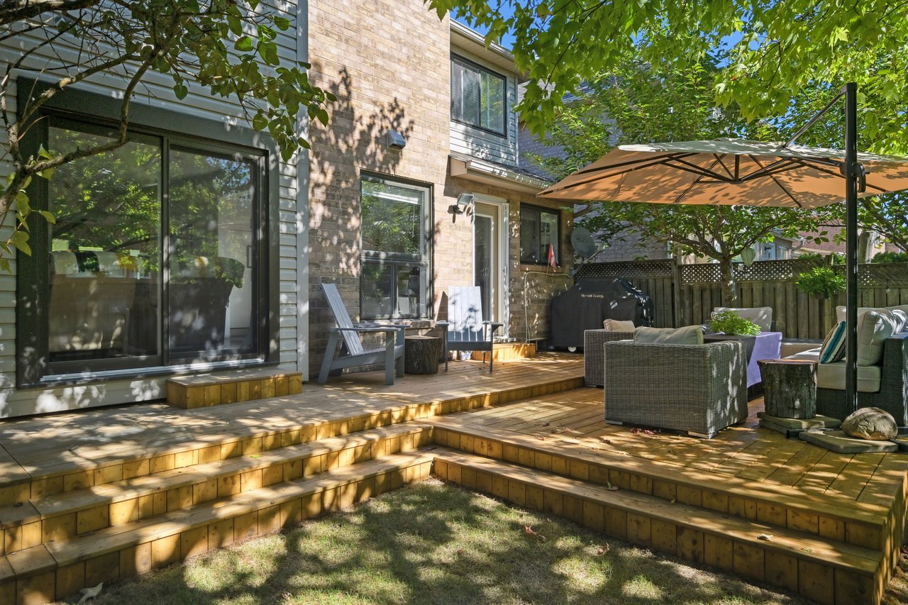 Sun-Filled Sophistication on a Rare Pie-Shaped Lot in West Oak Trails