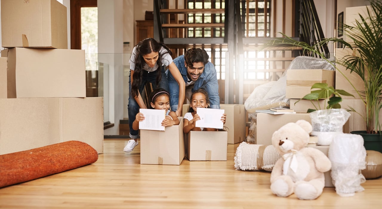 family moving into a new house together