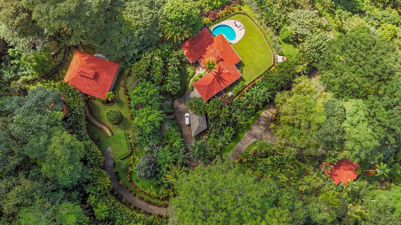 Ocean, jungle & mountain views on a meticulously landscaped 3-home family compound