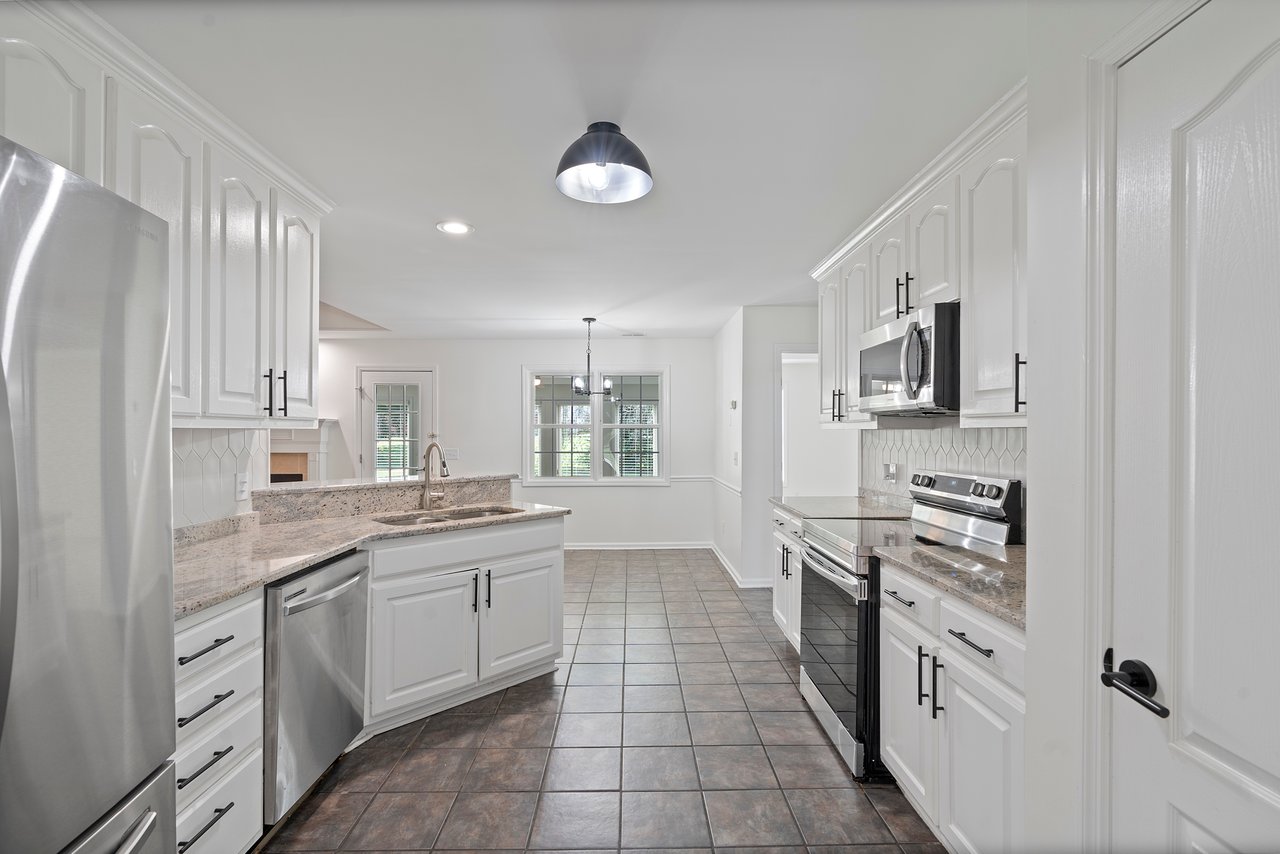 Updated Four Bedroom Home in Harvest!