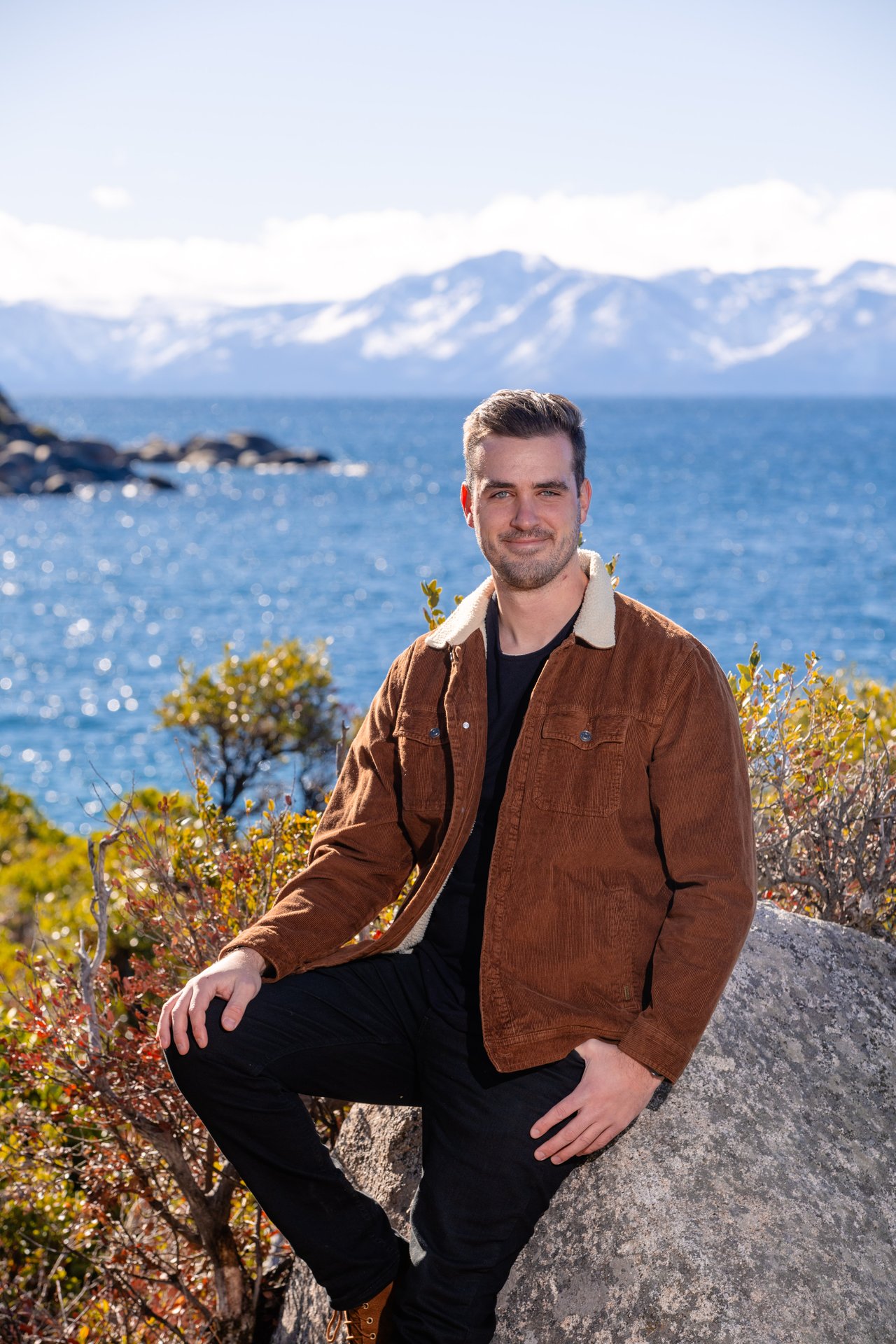 A Jackson Hole real estate agent showing a luxury home with scenic Teton mountain views, highlighting the benefits of working with a Certified Residential Specialist.