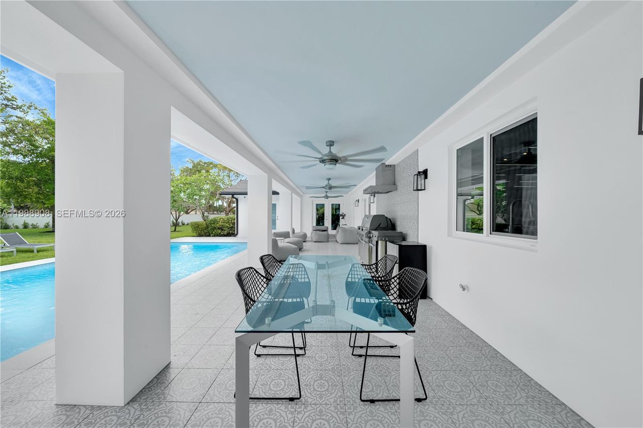 10705-sw-128-terrace-miami-home-for-sale-living-area-backyard