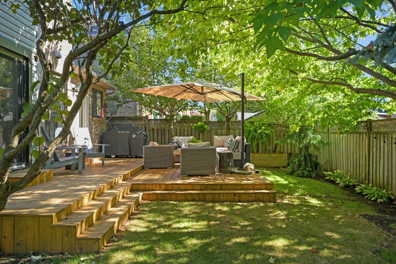 Sun-Filled Sophistication on a Rare Pie-Shaped Lot in West Oak Trails