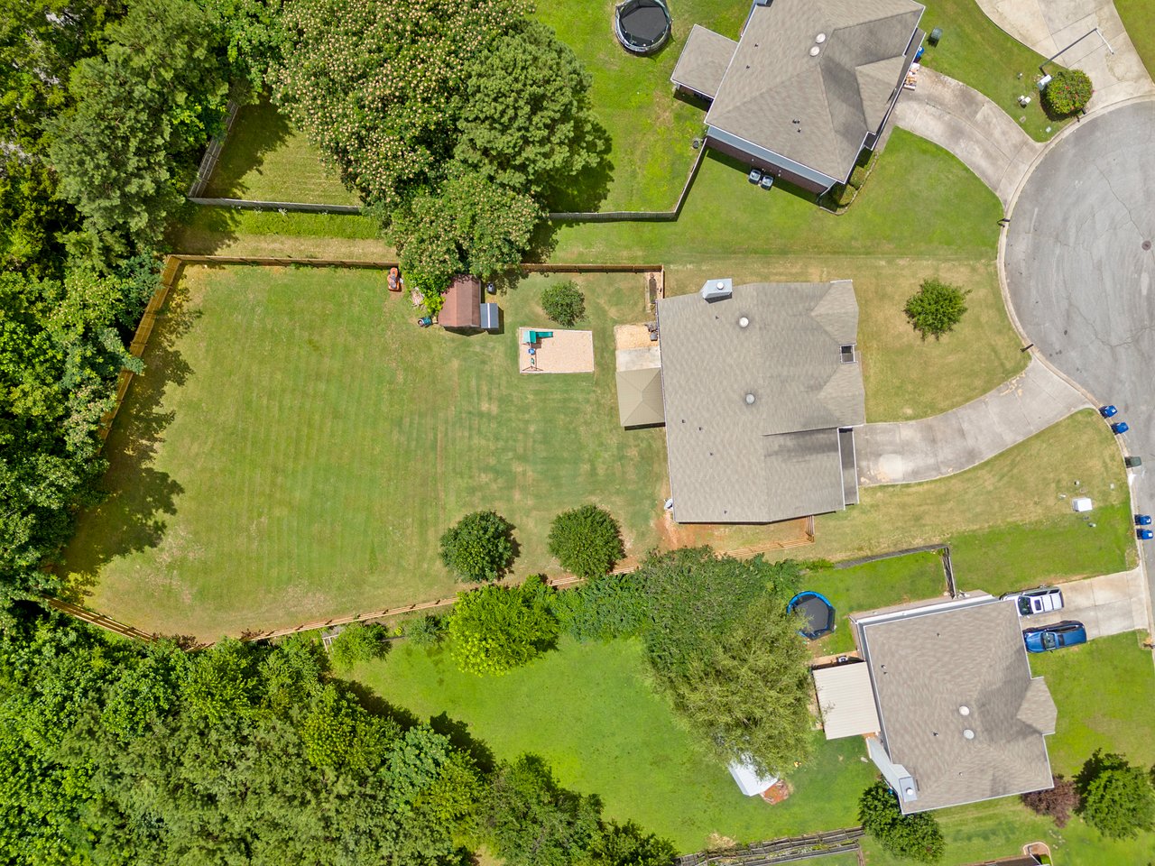 LOTS of Space both Inside and Outside!! Large Fenced in Backyard!