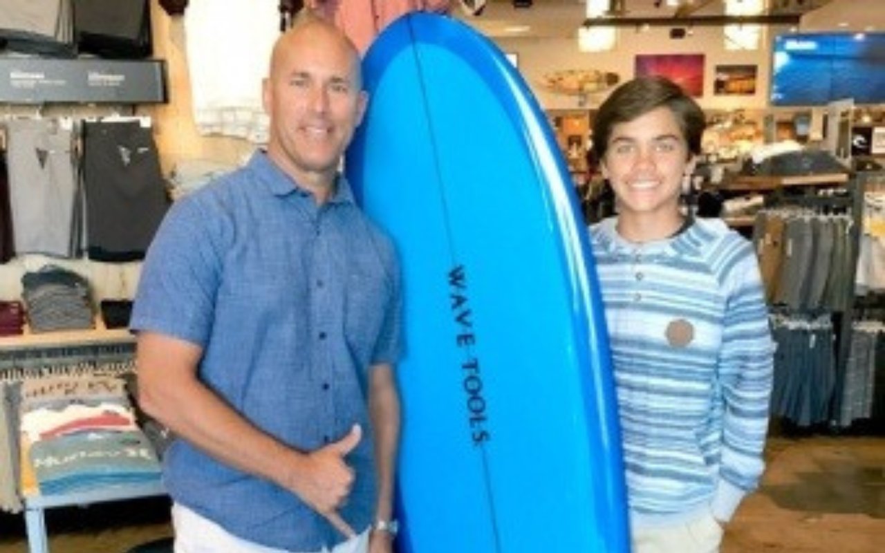 Arbor Real Estate Gives Away Wave Tools Surfboard to Local Student