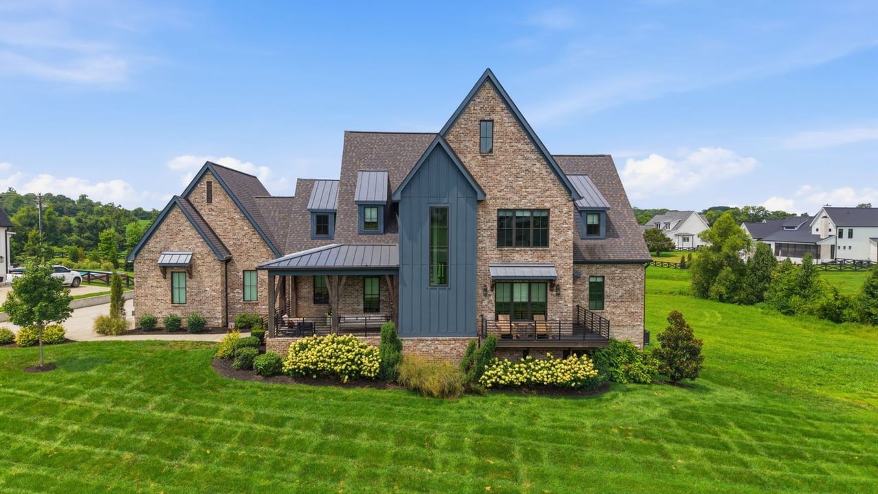 Listed at $2.6M, this 4-bed, 3.2-bath estate on 1.21 acres in Thompson's Station, TN offers a pool, screened porches, and true privacy. 