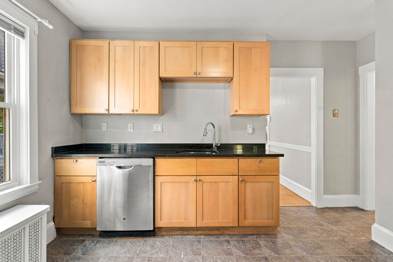 A Rare Two-Family Generational Asset with a Private Entrance to the Arnold Arboretum