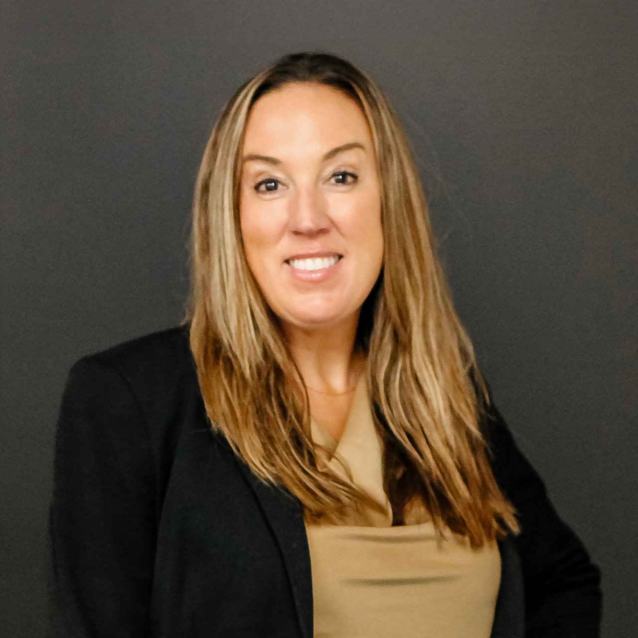 Professional headshot of Laura Sistrunk, a real estate agent specializing in Nashville and Sumner County at Stormberg Group at Compass.