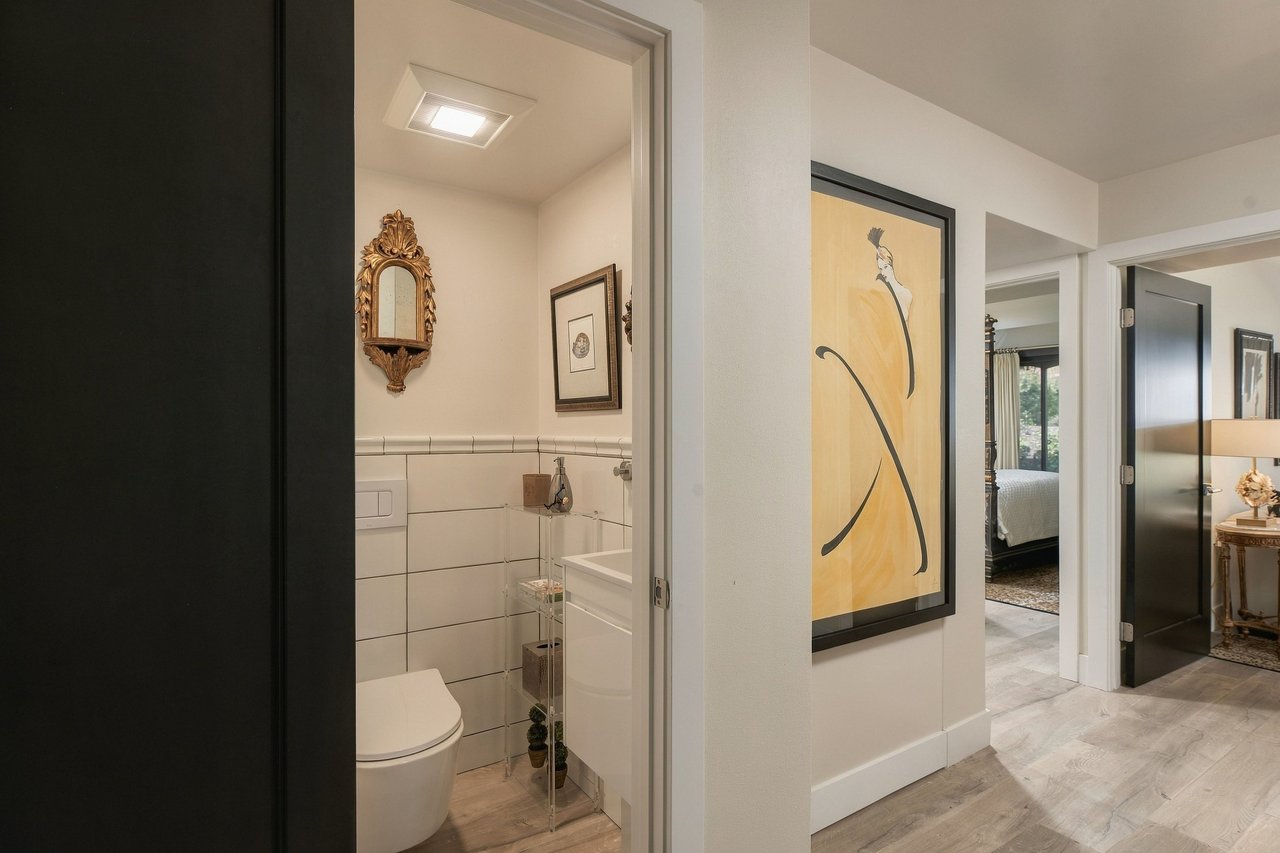 Updated bathroom and hallway with modern flooring