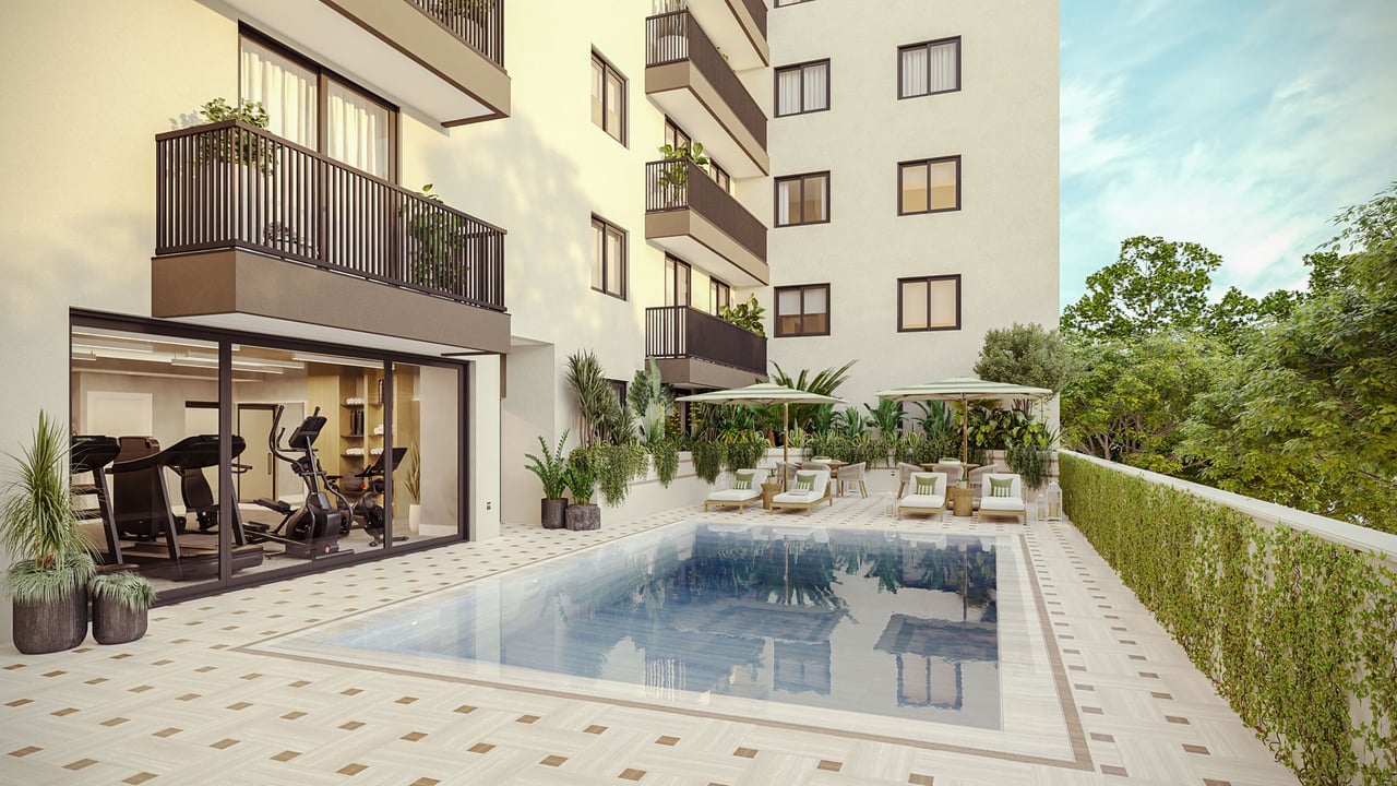 Botanic Residences courtyard pool beside landscaped seating and a glass-fronted fitness room.