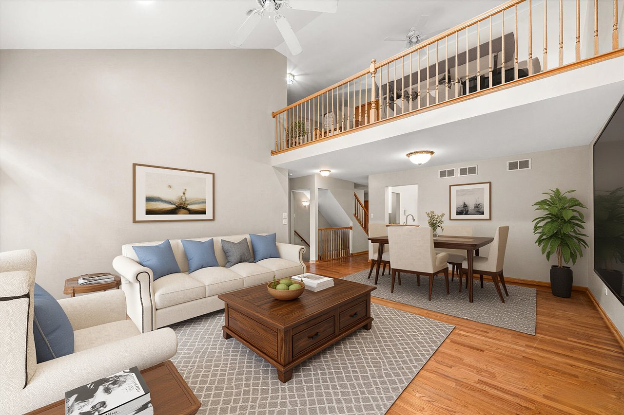 Combined living and dining room with volume ceilings at 2137 Prairie Lane Woodridge IL
