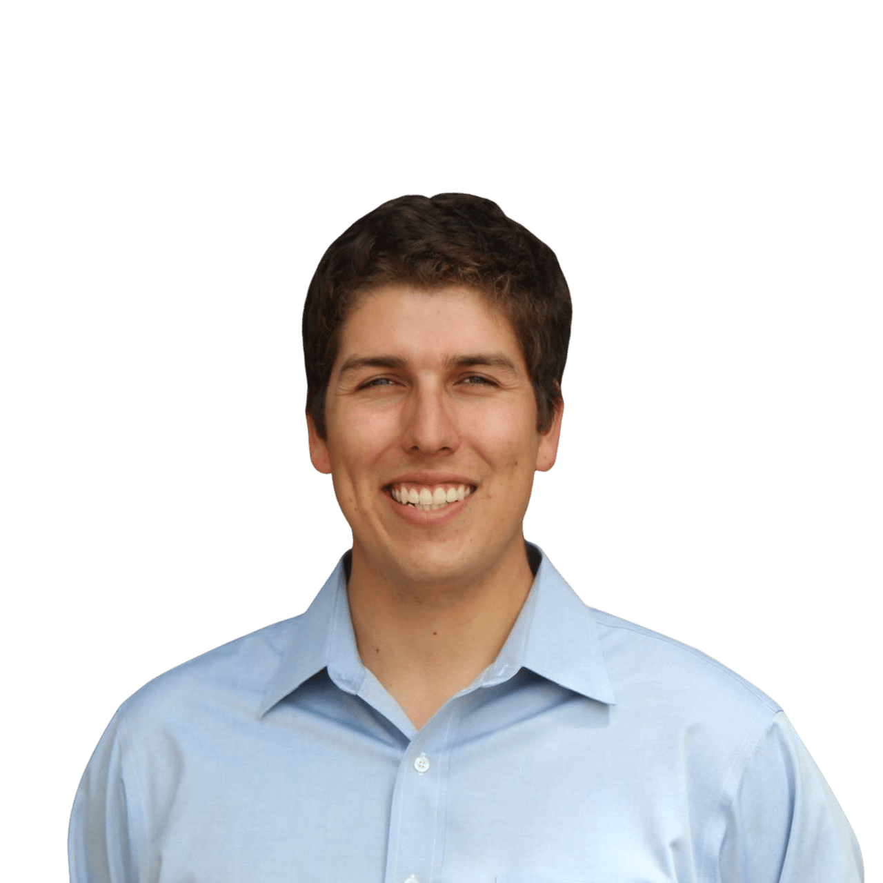 Daniel Henry-Castaneda smiling in a light blue collared shirt