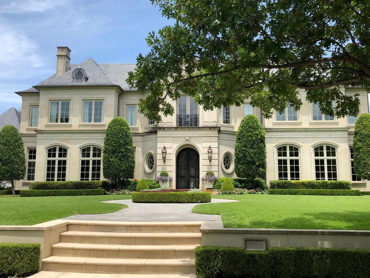 Limestone luxury estate with exquisite landscaping.