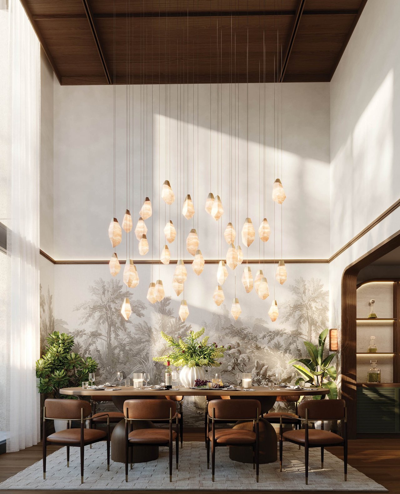 Furnished dining room with a tall pendant-light installation, botanical mural, and wood-paneled ceiling.