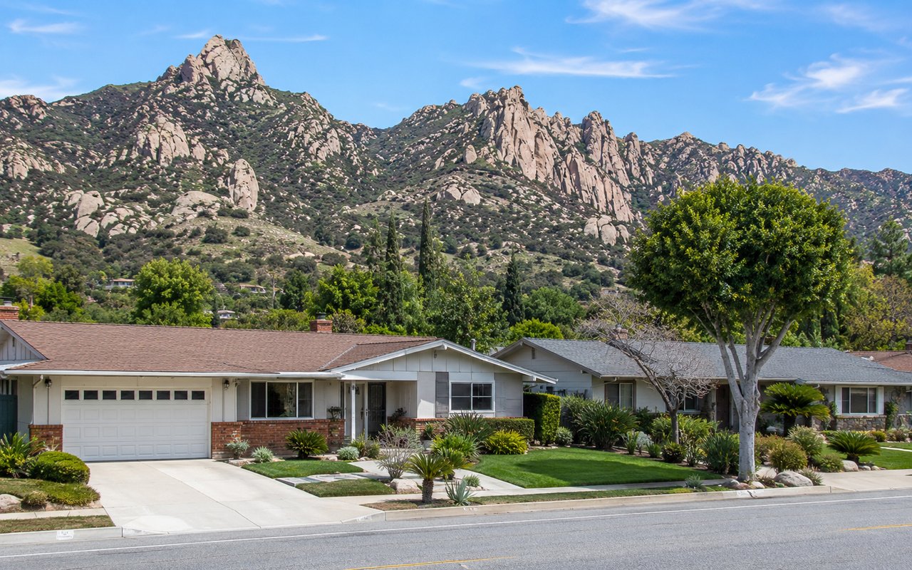 Single-story ranch homes in Chatsworth, CA with the Santa Susana rock formations in the background