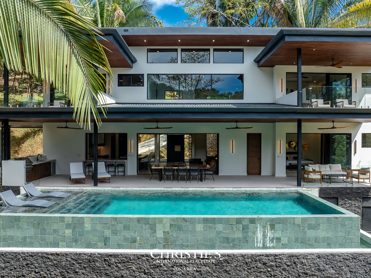 Modern Tropical Ocean & Mountain View Home