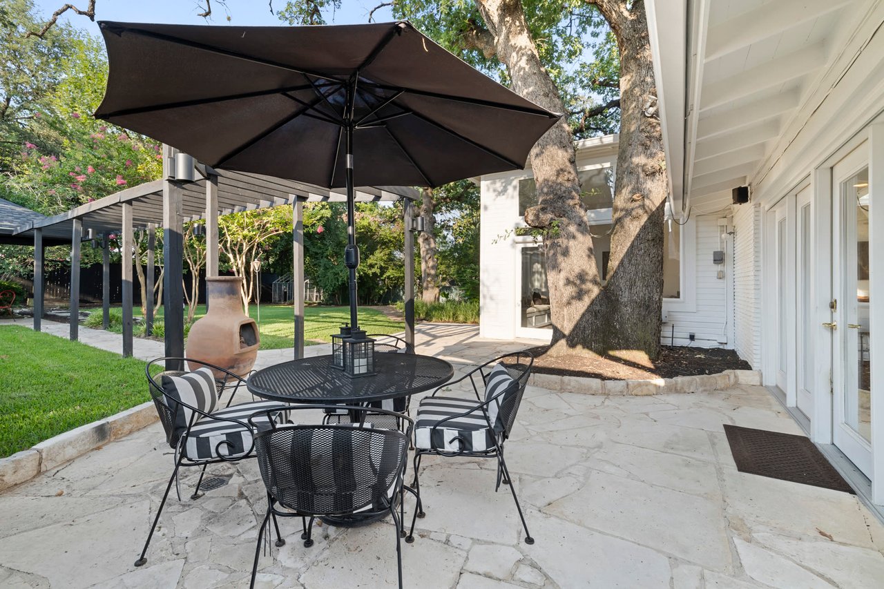 Twilight patio with string lighting, Tarrytown, Austin.