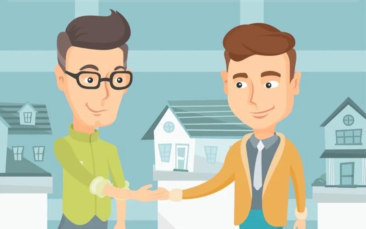 Two men shake hands in a neighborhood of houses.