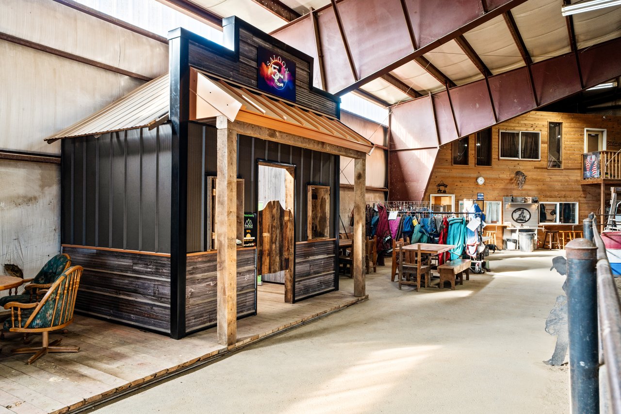Indoor equestrian arena at 5C Arena & Event Center used for roping and events in Montana