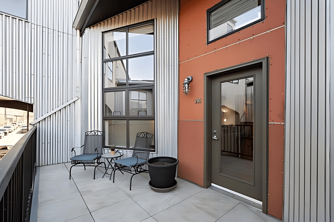 Just Listed: Soaring Vaulted Ceilings, 10’ Windows, and a Sleek Industrial Vibe Make a Striking First Impression in This Two-bedroom, Two-bathroom Fire Clay Loft!