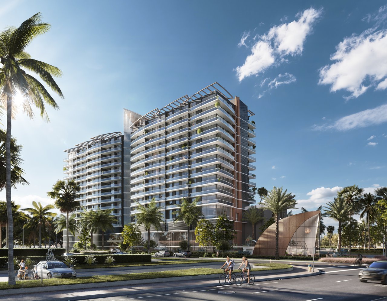 NEXO Residences condominium building with curved balconies, palm trees, and a landscaped street.
