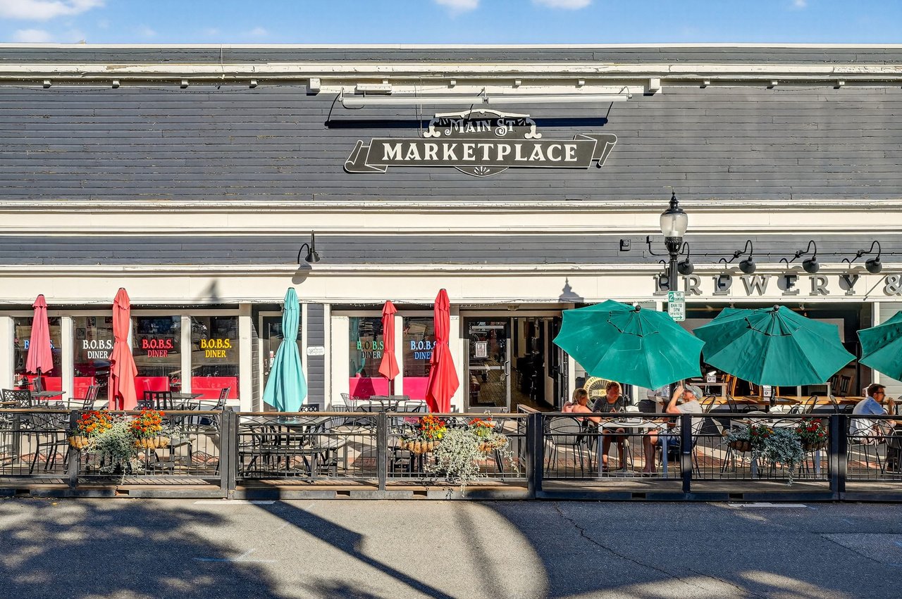 Exterior view of Main Street Marketplace shopping center in Louisville, CO.