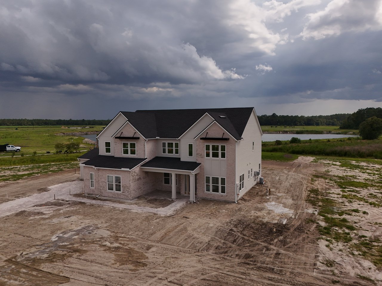 Luxury New Construction Home at Iron Branch with Lake View