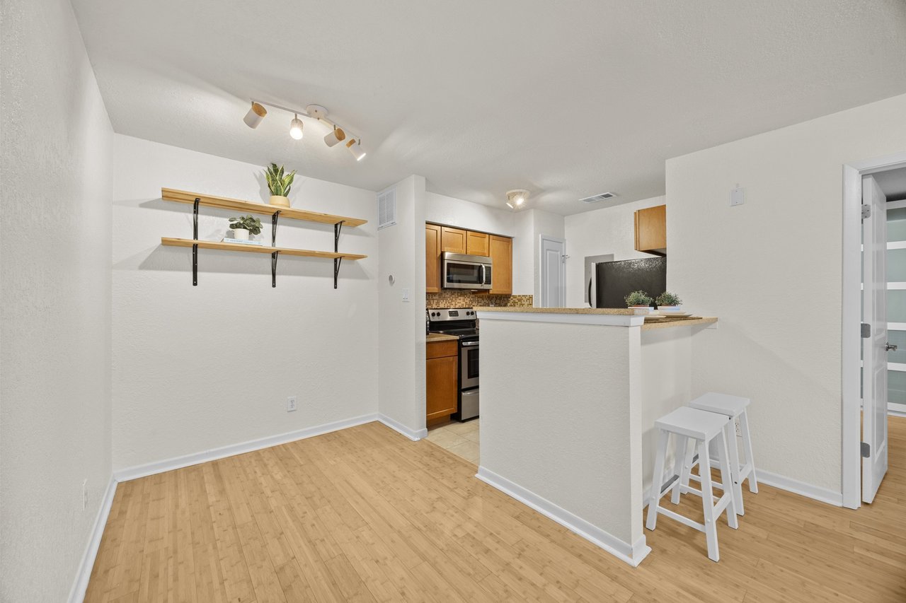 Top-Floor Condo Retreat in Gated Ivy Condos | Private Balcony + Tree-Filled Views