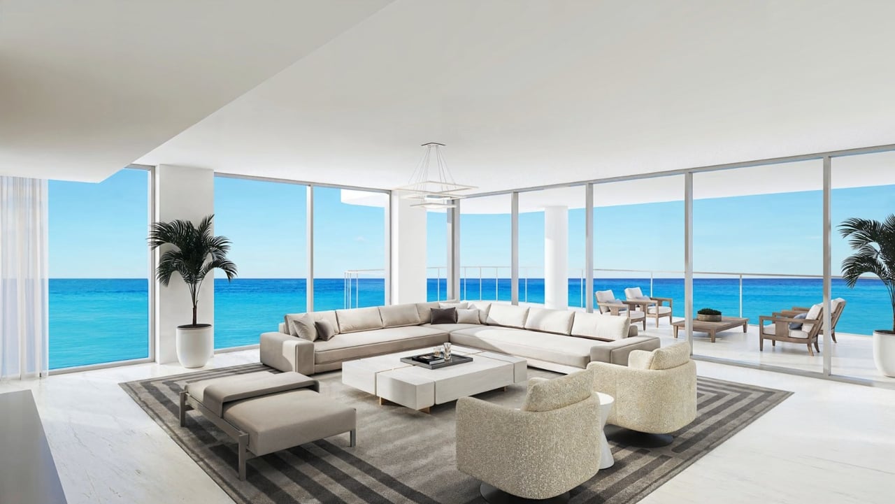 Ocean 580 residence living room rendering with ocean-facing windows.