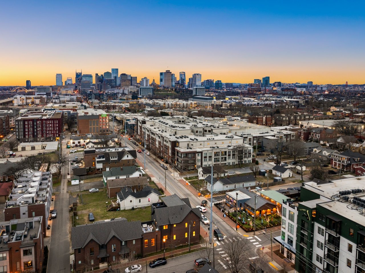 Germantown Nashville streetscape featuring historic homes, luxury condos, local restaurants, and walkable urban living near Downtown Nashville.
