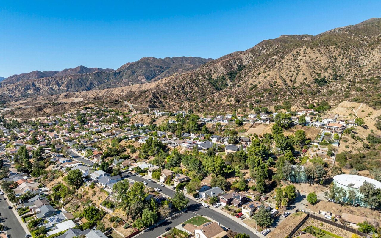 Sylmar neighborhood aerial view with San Gabriel Mountains San Fernando Valley Los Angeles