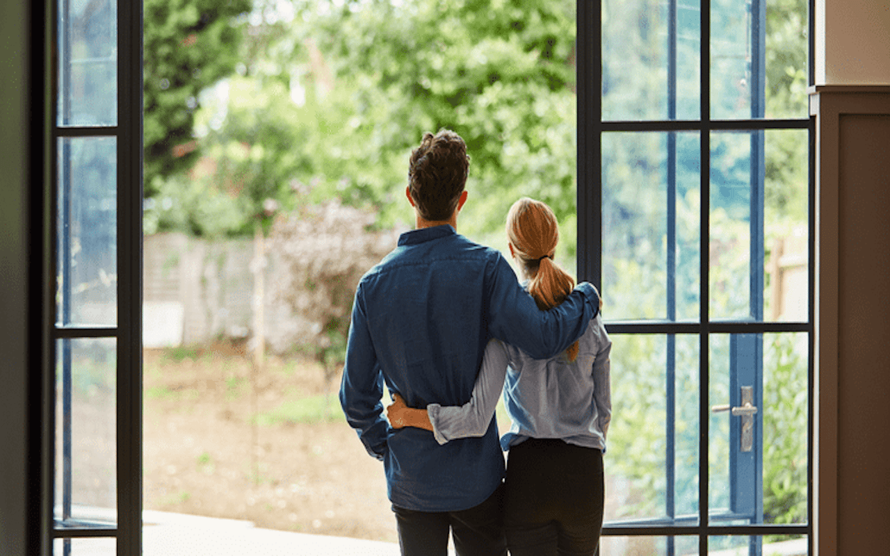 two people in a doorway