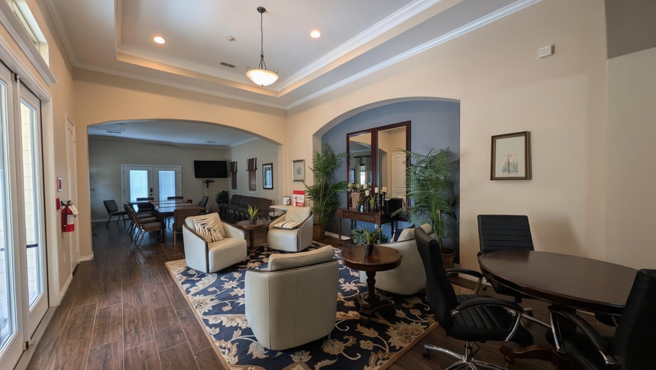 Seating area near front entry in Club Isabella