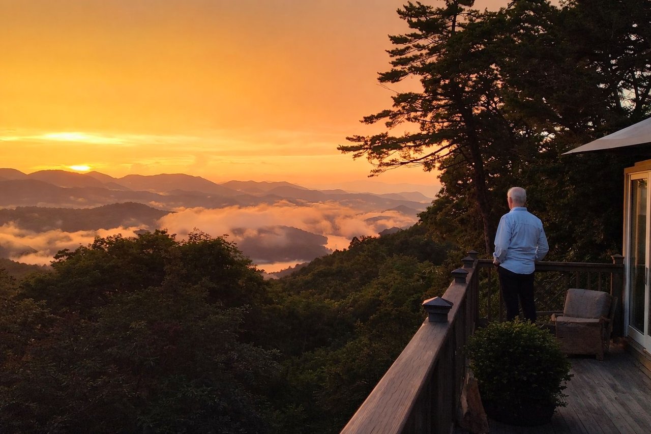 Sunset over the Blue Ridge Mountains and Lake Glenville from a deck in Big Sheepcliff, Cashiers NC