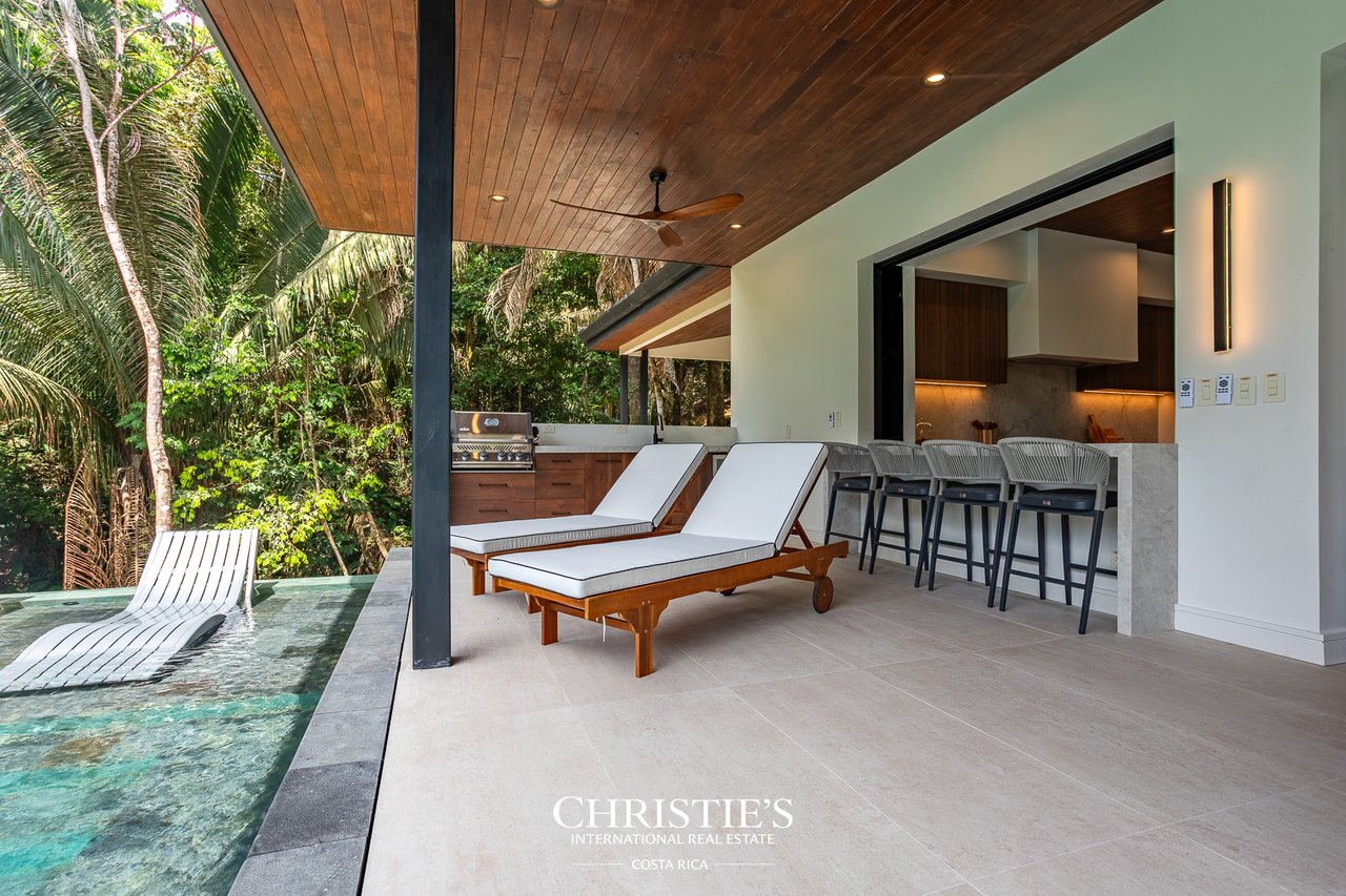 Modern Tropical Ocean & Mountain View Home